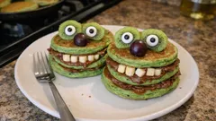 Halloween Monster Pancakes: Fluffy Green Stacks with Hazelnut Spread and Fruit Faces